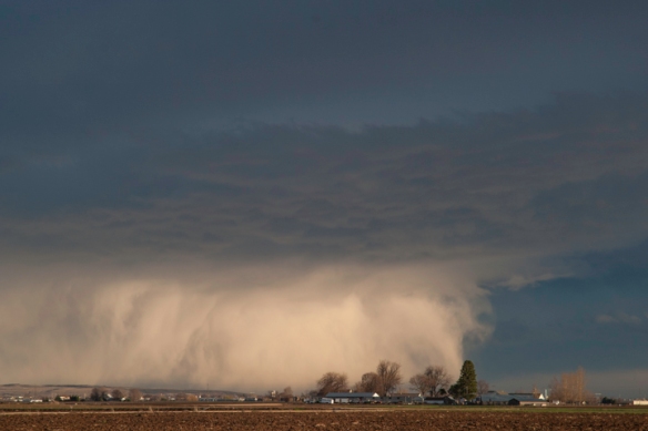 Storm rolling through Idaho farm land